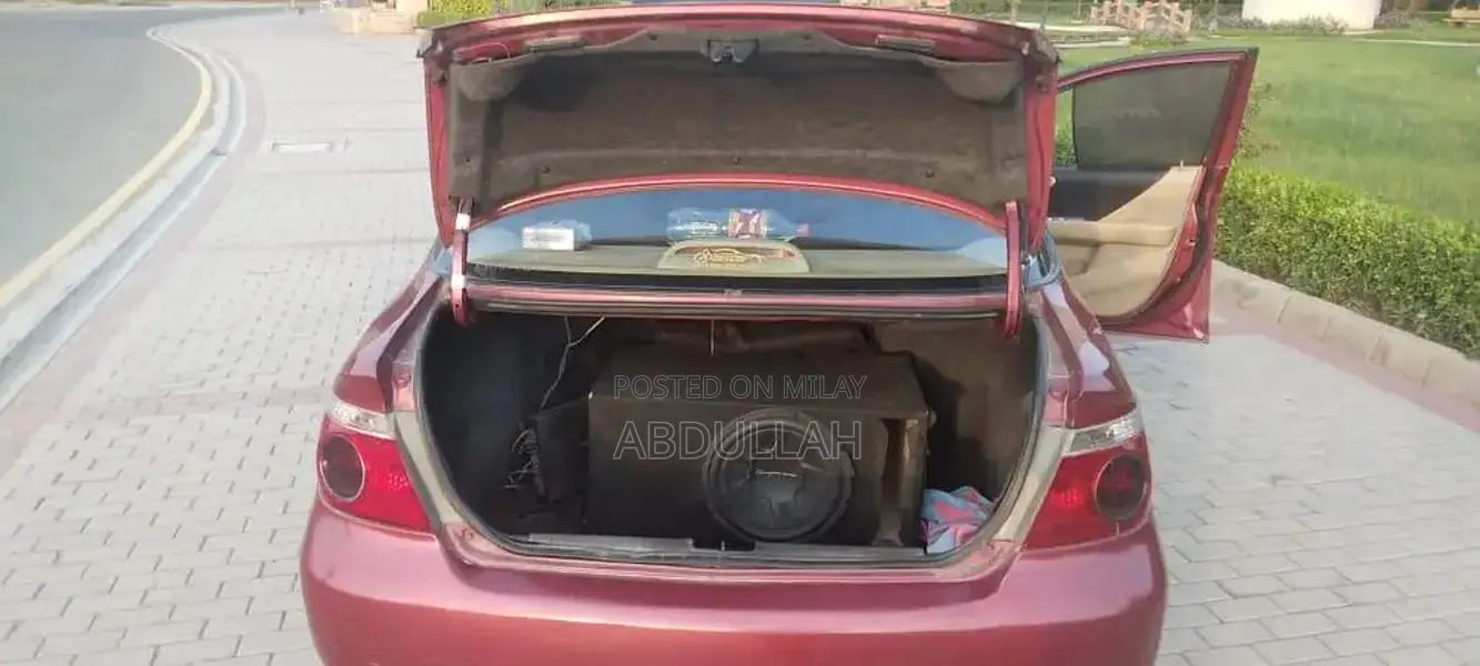 Honda City 2007 Sedan - Well-Maintained Red Compact Car