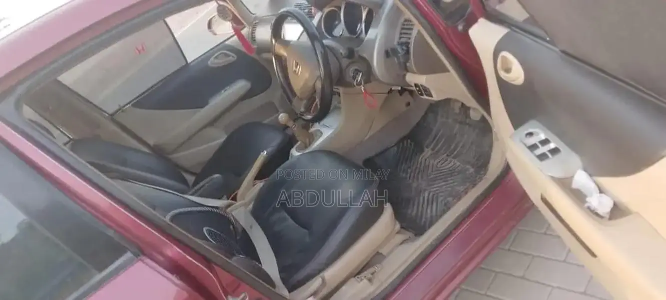 Honda City 2007 Sedan - Well-Maintained Red Compact Car