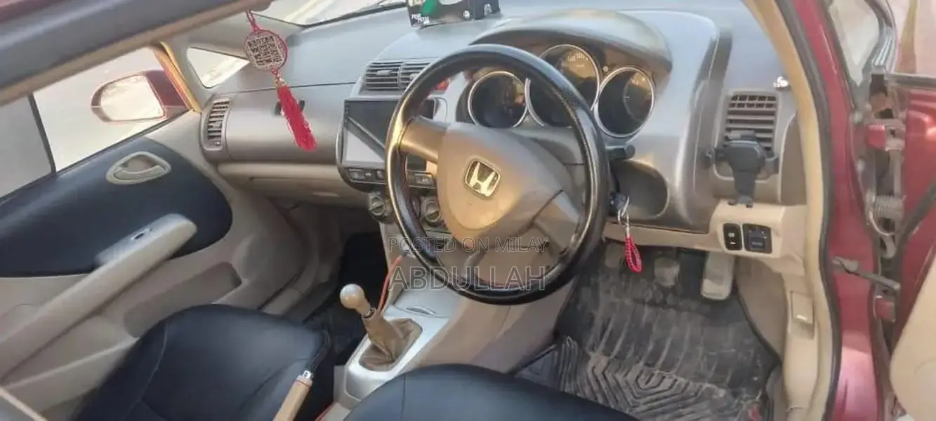 Honda City 2007 Sedan - Well-Maintained Red Compact Car