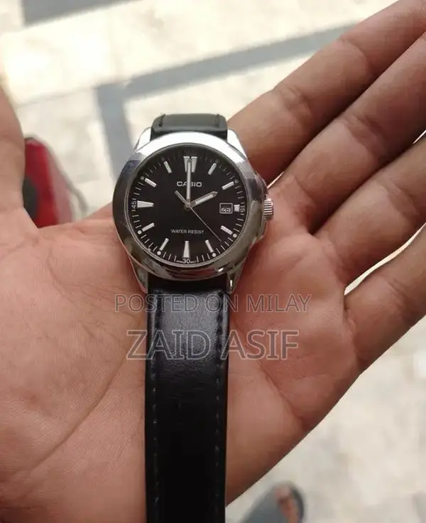 Casio Men's Quartz Watch with Black Dial and Leather Strap - MTP-1215