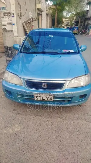 Photo - Honda City 2001 Sedan - Well-Maintained Family Vehicle
