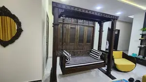 Photo - Wooden Swing with Striped Seat and Decorative Pillows