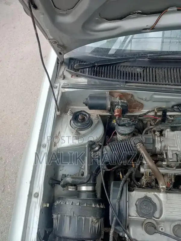 Suzuki Cultus Reliable Compact Sedan