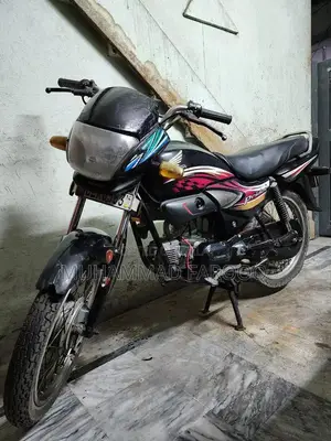 Photo - Honda Pridor 100cc Motorcycle - Well Maintained Commuter Bike