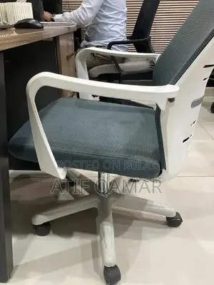 Photo - Adjustable Ergonomic Office Chair with Movable Headrest