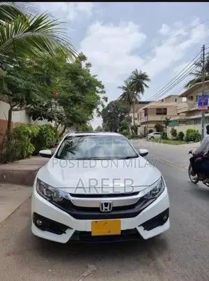 Photo - Honda Civic Oriel 1.8 Sedan - Well-Maintained Reliable Vehicle