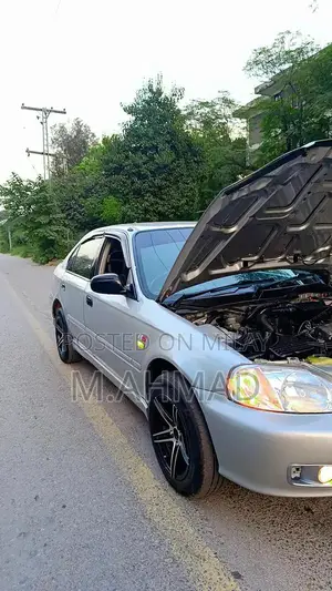 Honda Civic 2000 EXI Sedan - Well Maintained Family Car