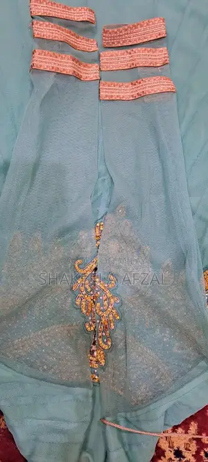 Elegant Net Long Flare Frock with Pearl Embellishments