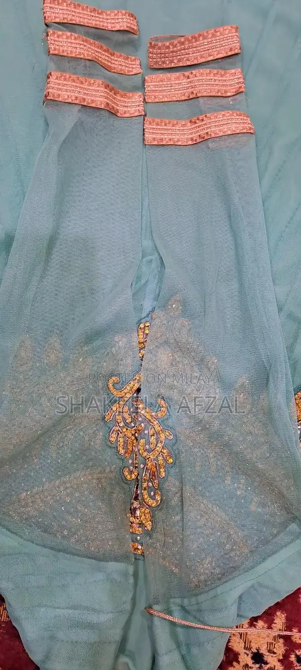 Elegant Net Long Flare Frock with Pearl Embellishments