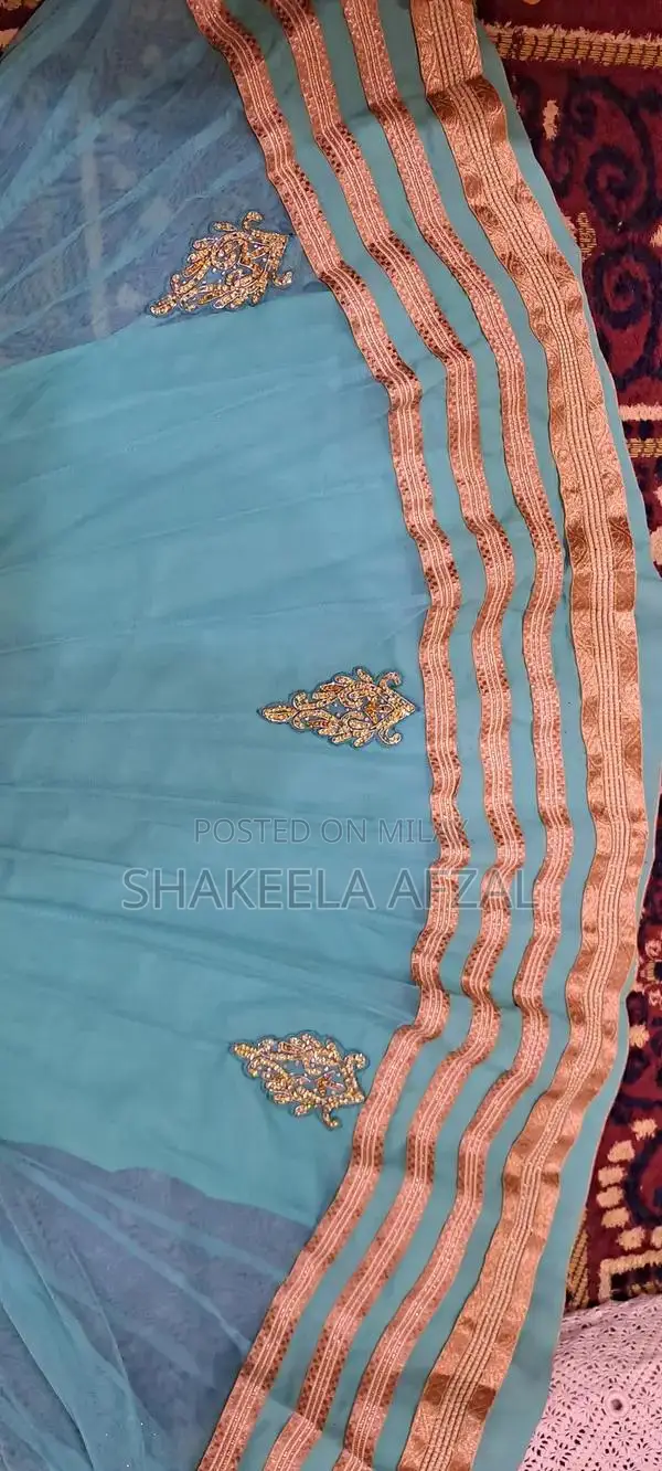 Elegant Net Long Flare Frock with Pearl Embellishments