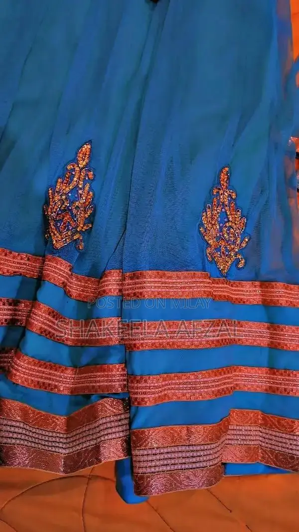 Elegant Net Long Flare Frock with Pearl Embellishments