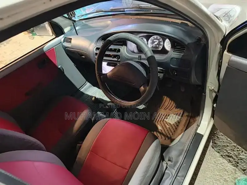 Daihatsu Coure Compact Sedan - Well-Maintained Imported Vehicle