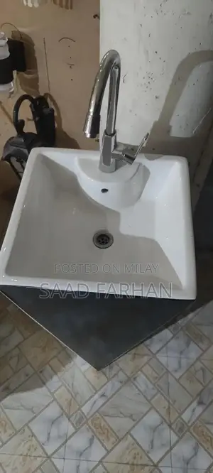 Fine Ceramic Bathroom Basin with Modern Faucet Design