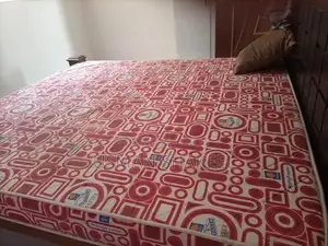 Photo - Laminate Wood Bed Frame with Molty Foam Mattress