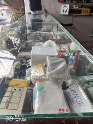 Photo - Glass Showcase Display Cabinet - Sliding Mirror Door