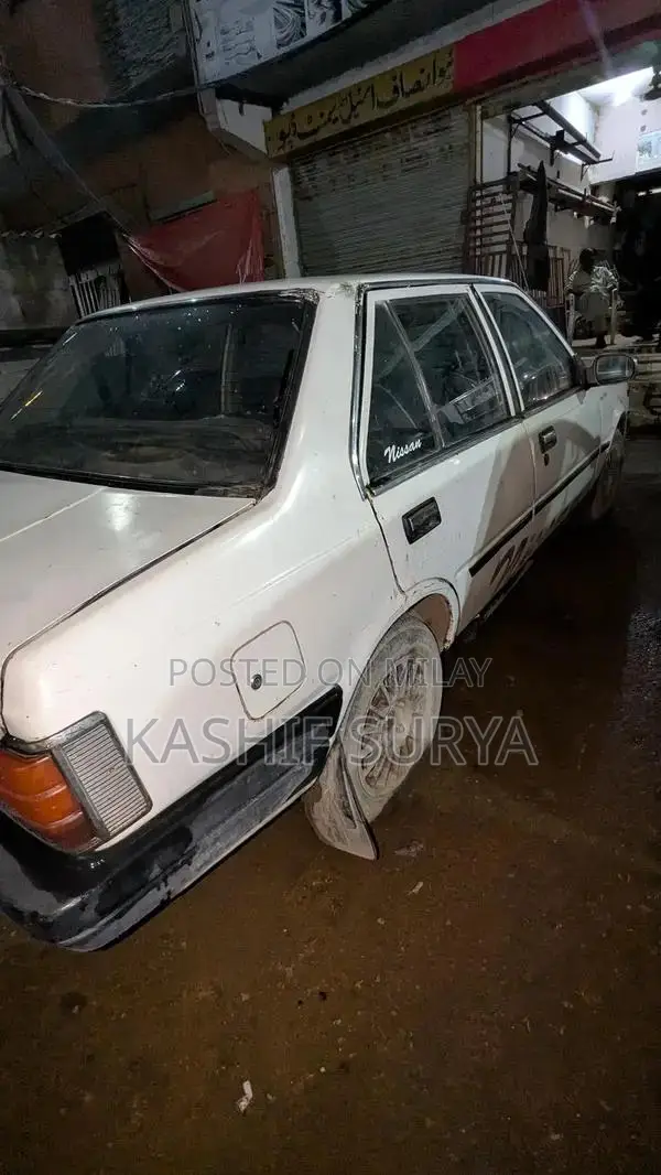 Nissan Sunny 86 Sedan - Reliable Compact Car