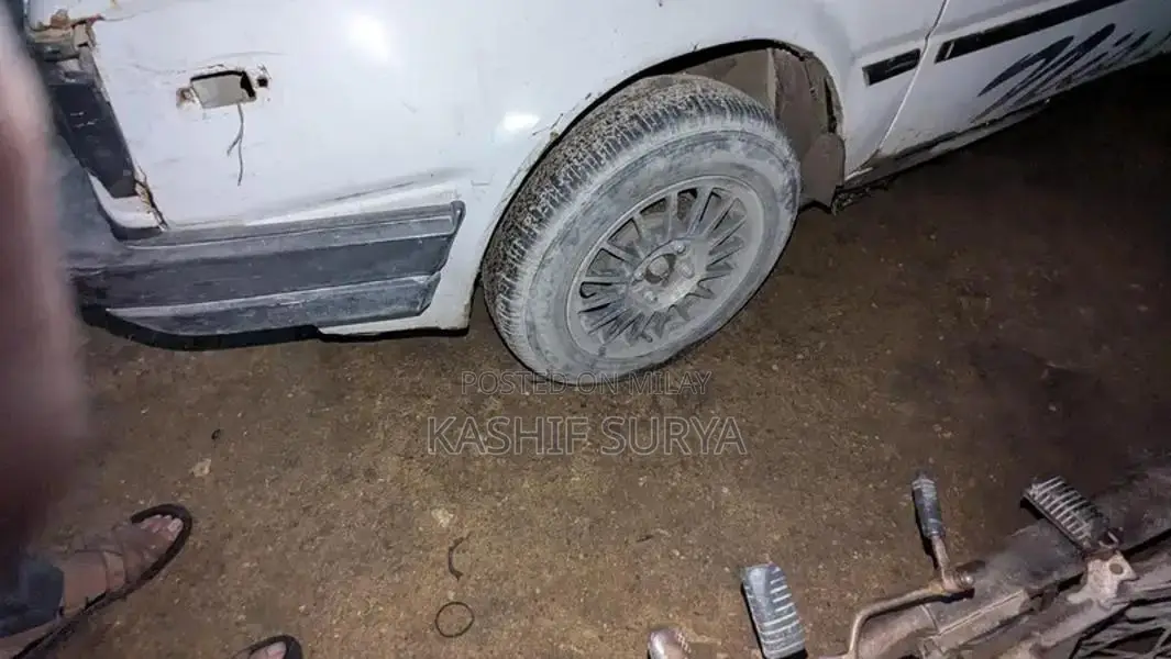 Nissan Sunny 86 Sedan - Reliable Compact Car