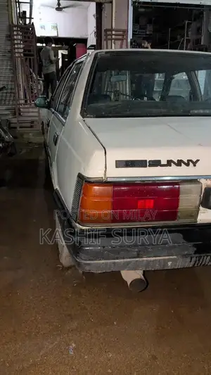 Nissan Sunny 86 Sedan - Reliable Compact Car