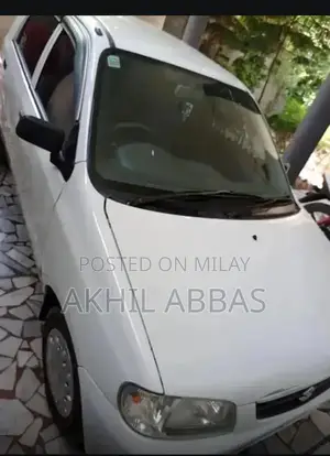 Photo - Argent White 660cc Engine Sedan with Power Steering