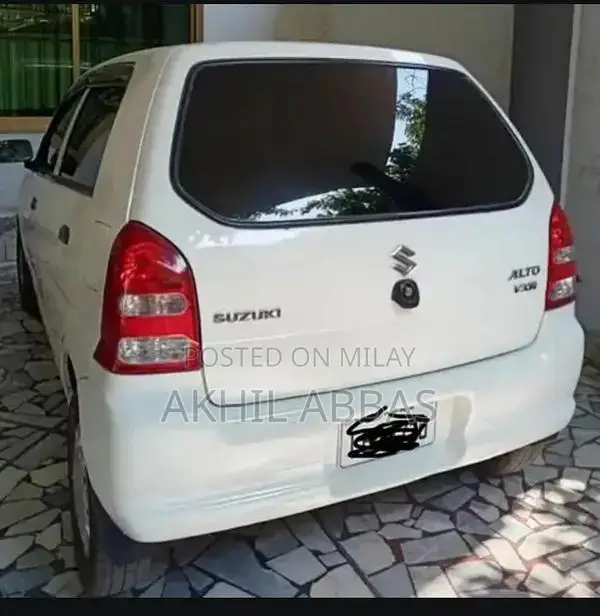 Argent White 660cc Engine Sedan with Power Steering