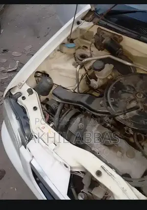 Argent White 660cc Engine Sedan with Power Steering