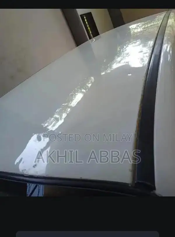 Argent White 660cc Engine Sedan with Power Steering