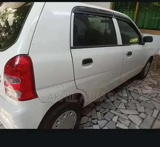 Argent White 660cc Engine Sedan with Power Steering