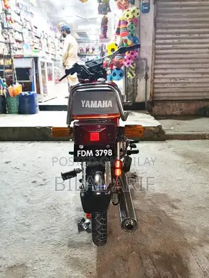 Photo - Yamaha 100cc Motorcycle - Compact Single Cylinder Bike
