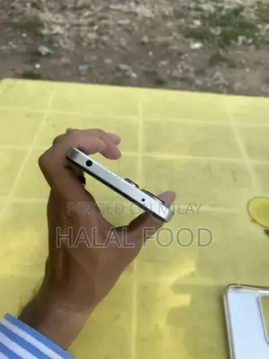 Compact Smartphone with 6/128GB Storage, Minimal Usage