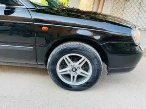 Baleno Sedan - Well-Maintained Family Car with Reliable Performance