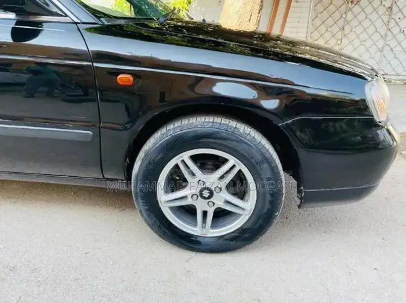 Baleno Sedan - Well-Maintained Family Car with Reliable Performance