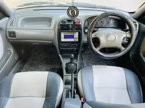 Baleno Sedan - Well-Maintained Family Car with Reliable Performance