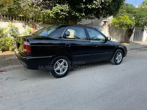 Baleno Sedan - Well-Maintained Family Car with Reliable Performance