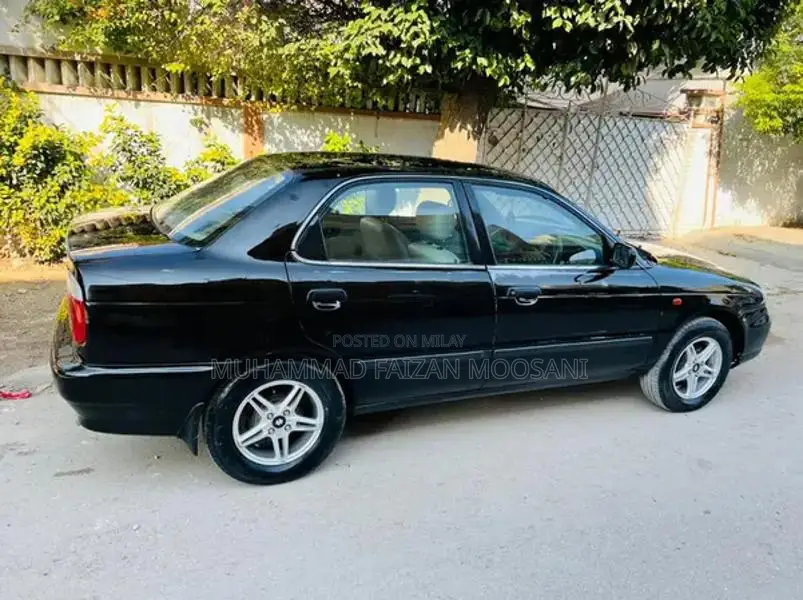 Baleno Sedan - Well-Maintained Family Car with Reliable Performance