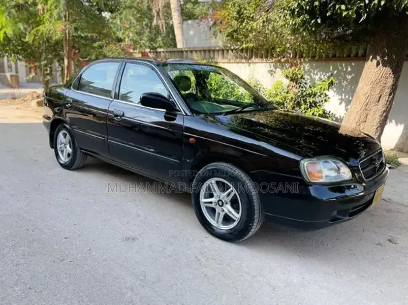 Baleno Sedan - Well-Maintained Family Car with Reliable Performance