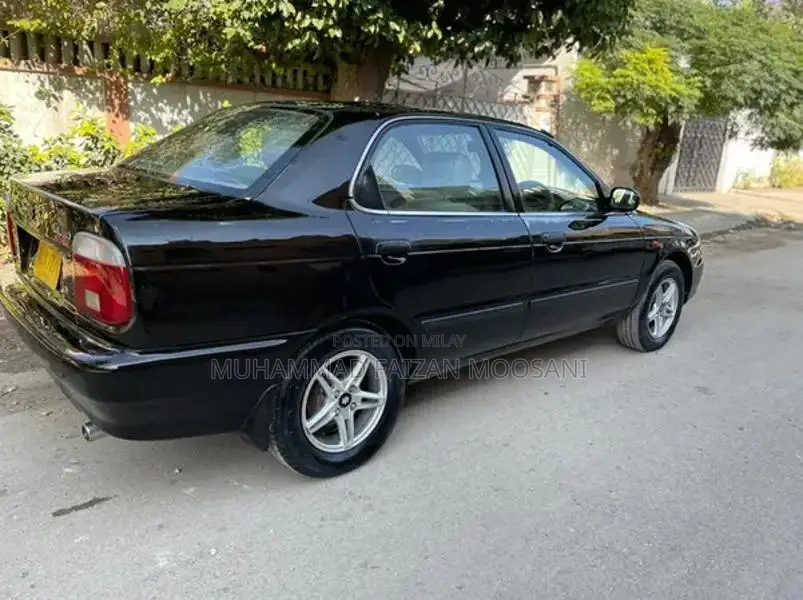 Baleno Sedan - Well-Maintained Family Car with Reliable Performance