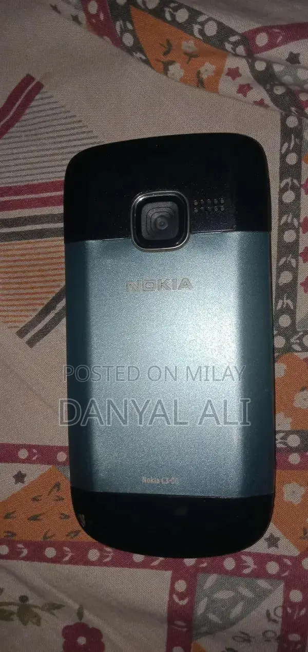 Nokia C3 Compact Mobile Phone with Charger