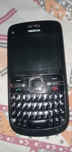 Nokia C3 Compact Mobile Phone with Charger