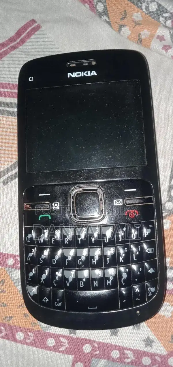 Nokia C3 Compact Mobile Phone with Charger