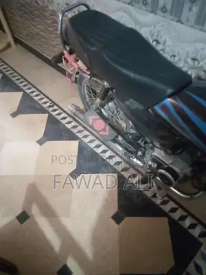 Photo - Honda 70 Single Cylinder Motorcycle