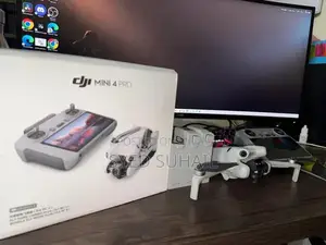 Photo - DJI Mini 4 Pro Drone Combo Pack with Low Battery Cycles