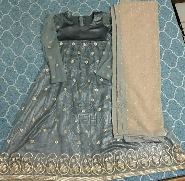 Lightly Used Clothing - One-Time Worn Garments for Sale