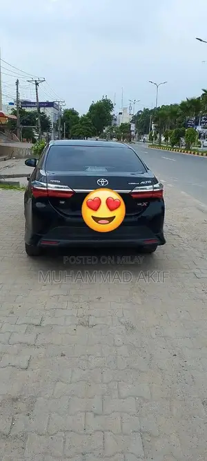 Photo - Toyota Corolla XLI Sedan - Upgraded Wheels and Interior