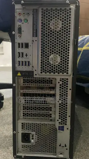 Complete Gaming PC Setup with Steering Wheel and Peripherals