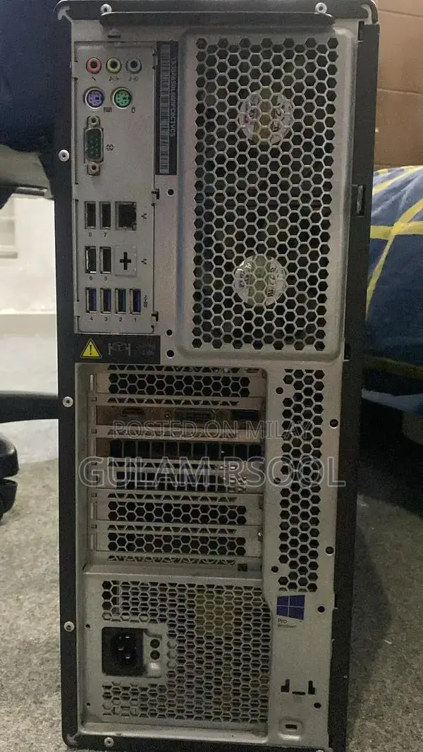 Complete Gaming PC Setup with Steering Wheel and Peripherals