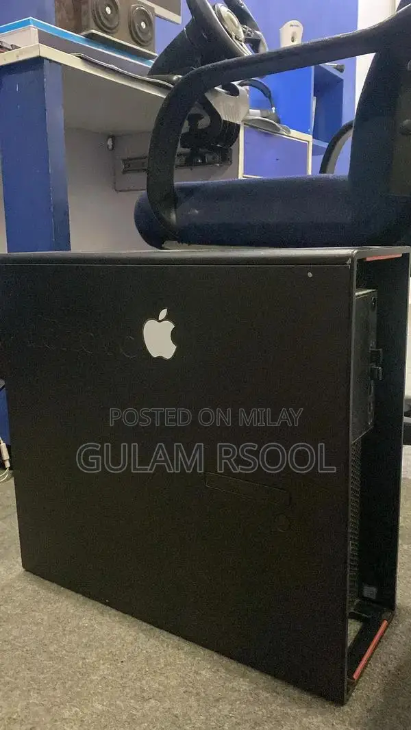 Complete Gaming PC Setup with Steering Wheel and Peripherals