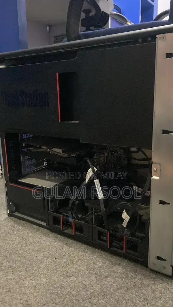 Complete Gaming PC Setup with Steering Wheel and Peripherals