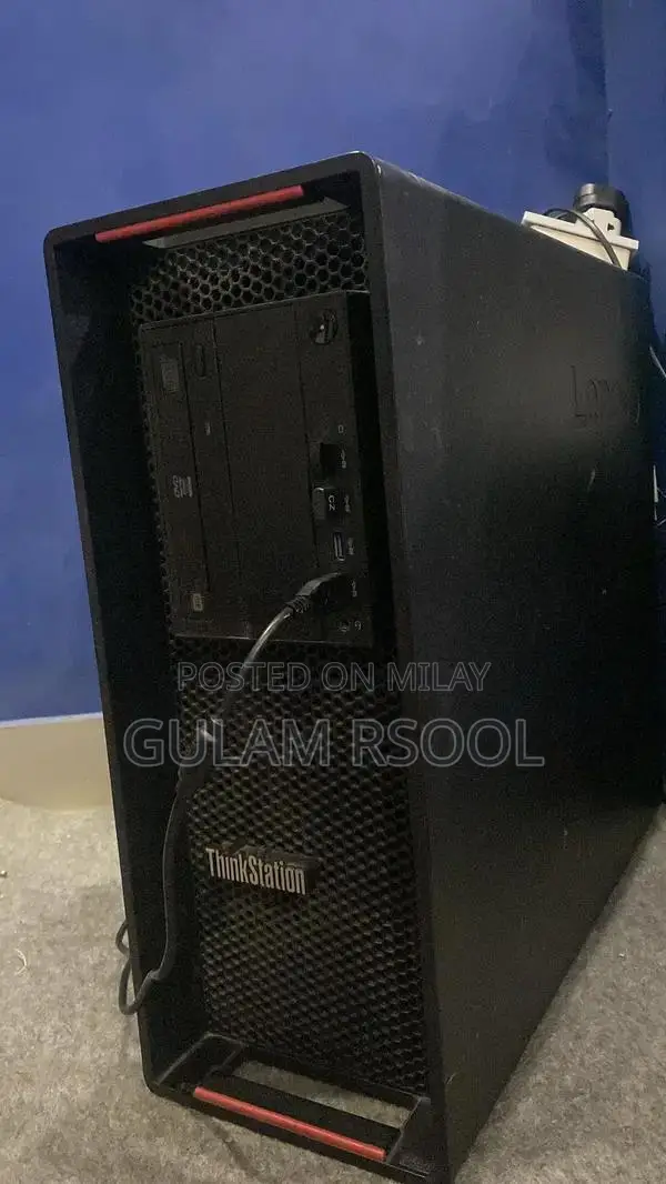 Complete Gaming PC Setup with Steering Wheel and Peripherals