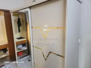 Bedroom Furniture Set - Bed, Nightstands, and Dressing Cupboard