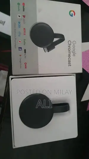 Photo - Google Chrome Cast Media Streaming Device
